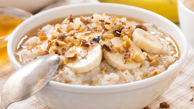 porridge oats in a bowl with banana honey and nuts